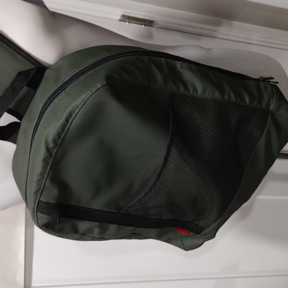 HUGO Hugo Boss green rubberized nylon crossbody backpack.
